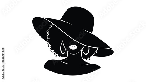 Elegant woman wearing a wide brimmed hat striking black and white silhouette