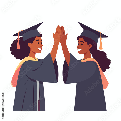 Two female graduates in caps and gowns celebrating their achievement with a high-five