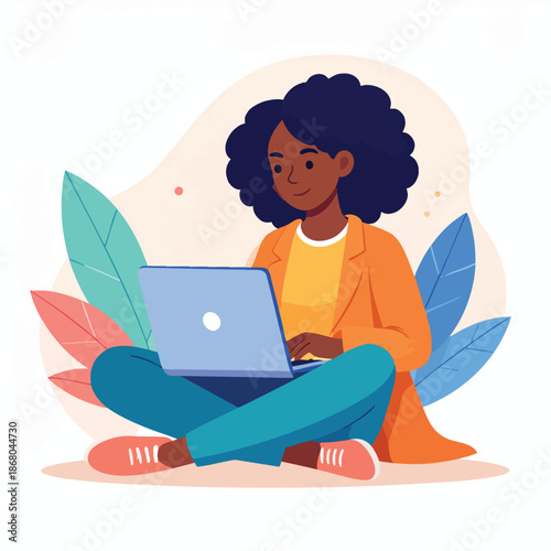 Woman sitting cross-legged with laptop surrounded by leaves