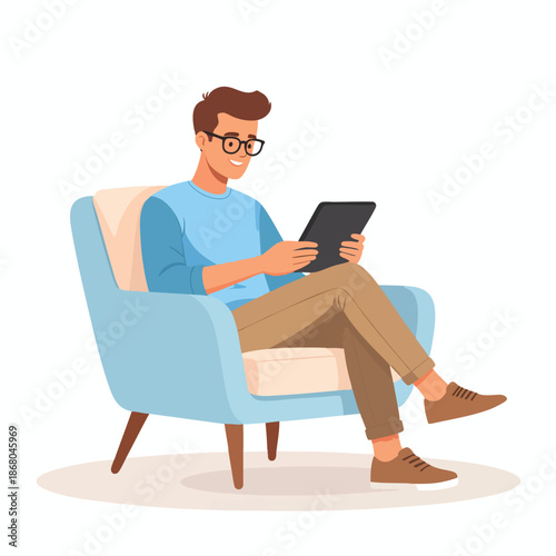 Man Relaxing on Sofa Using Tablet