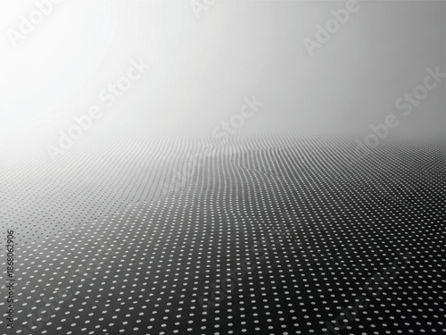 Gray and white background with small dots