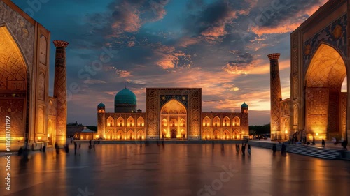 Stunning view of registan square in samarkand, uzbekistan at sunset with illuminated madrassas and dramatic sky, 4k video