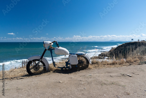 Retro cross bike on the beach in Ravda resort in Bulgaria