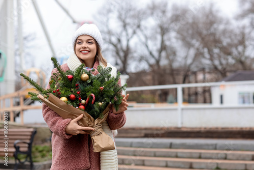 Young woman with Christmas ...