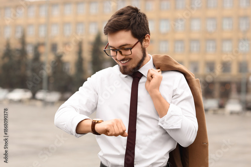 Handsome businessman in eye...