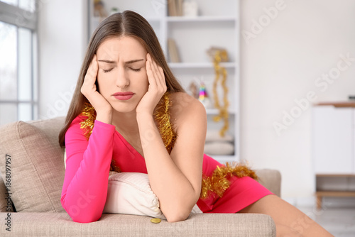 Young woman with hangover s...