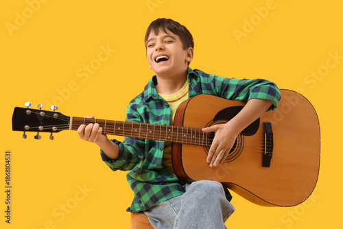 Happy boy singing and playi...