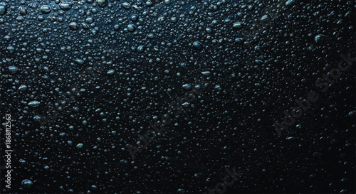 Close Up Background Texture of Dark Blue Rain Drops on Surface
