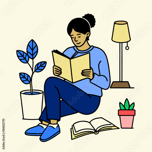 Woman reading a book in a cozy setting