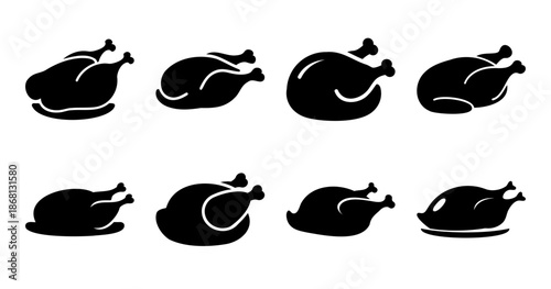 Set of eight black and white chicken silhouettes on an isolated background