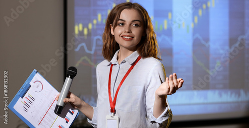 Female business speaker wit...
