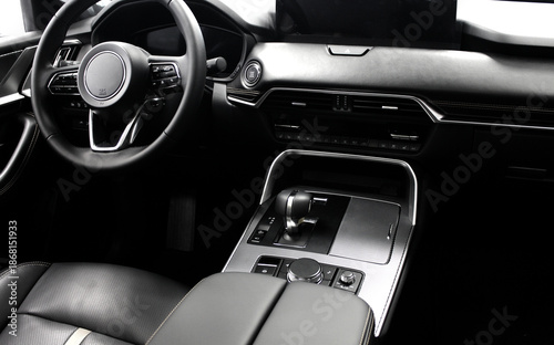 Fotografie Prestigious interior of a business class car is finished with aluminum and black