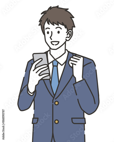 スマホを見て喜ぶ男子高校生