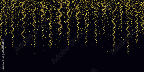 Golden glitter cascade against a black background creating a festive atmosphere