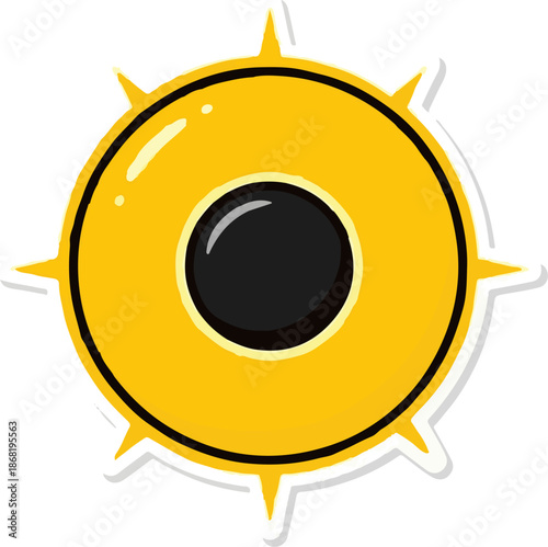 A yellow, round, cartoonish object with a black center and spiky protrusions