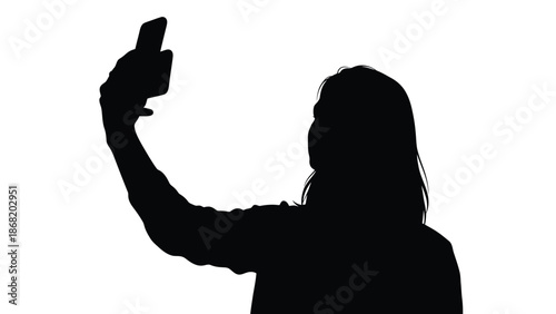 Silhouette of a young woman holding a smartphone high above her head to capture a perfect selfie photograph in an isolated white background setting demonstrating modern communication technology usage