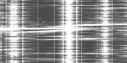 An abstract silver brushed metal background features a textured aluminum surface with a dark steel pattern and shiny metallic lines for a modern grey material backdrop design