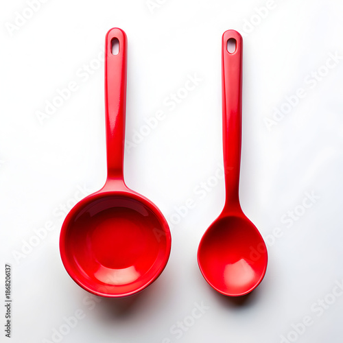 red ladle spoon on white background