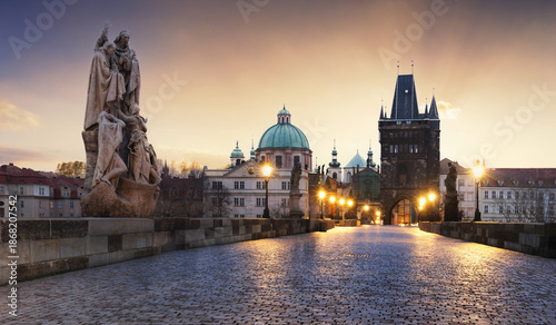 Картината върху платно Charles Bridge over River Vltava at dramatic sunrise in Prague, Czech Republic,
