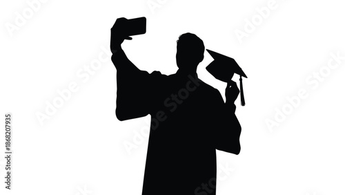 Silhouette of a joyful graduate in academic regalia capturing a celebratory selfie moment while holding a diploma scroll and mortarboard hat high in the air