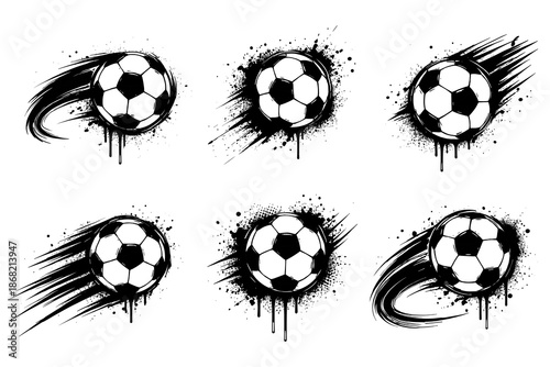 Artistic grunge soccer balls with dynamic paint streaks and splashes