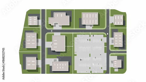 Aerial view of a small business park with multiple grey buildings and a large parking lot