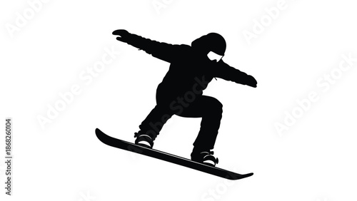 Silhouette of a snowboarder in mid air performing a trick on the slopes