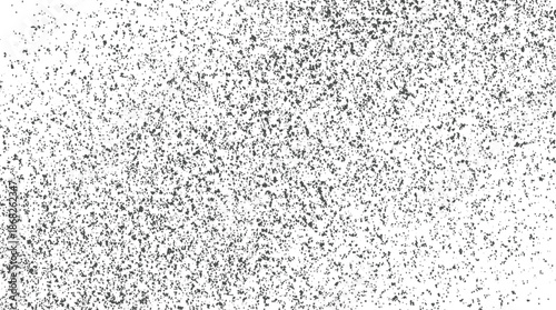 Abstract monochrome speckled texture background with scattered dark particles on a white canvas creating a subtle grainy effect for