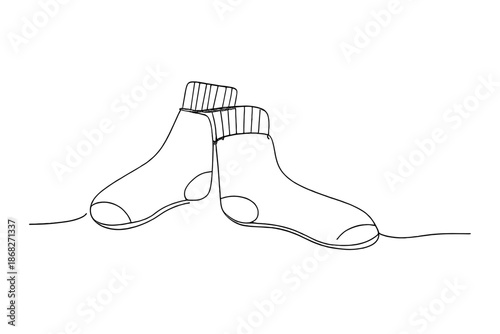 Minimalist Wool Socks. Relaxed wool socks couch scene. Minimalistic one-line drawing wool socks casually laid