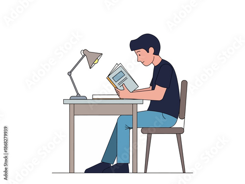 Man reading newspaper while sitting at desk with lamp