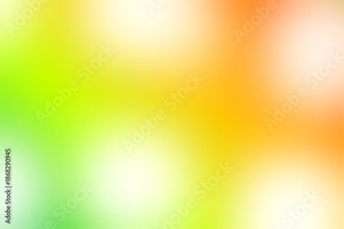 Abstract blurred background image of green, yellow, orange colors gradient used as an illustration. Designing for posters, interior, banner, card or advertisements.