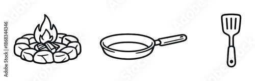 Campfire cooking setup with fire pit, frying pan, and spatula on dark background