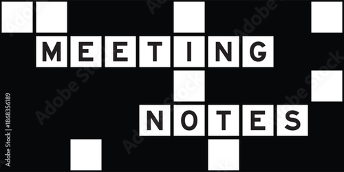 Alphabet letter in word meeting notes on crossword puzzle background