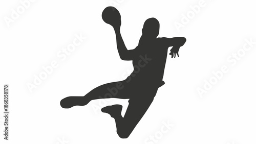 Dynamic silhouette of a male handball player in mid-air, powerfully throwing the ball with force and precision during a competitive sports match or training session