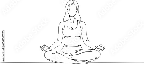 Woman practicing yoga in lotus position