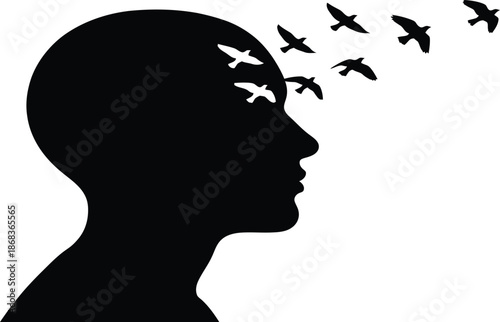 Silhouette of a person's head with birds flying out
