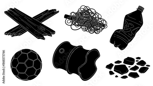Collection of various rubber and plastic waste including tires, bottles, and fragments for
