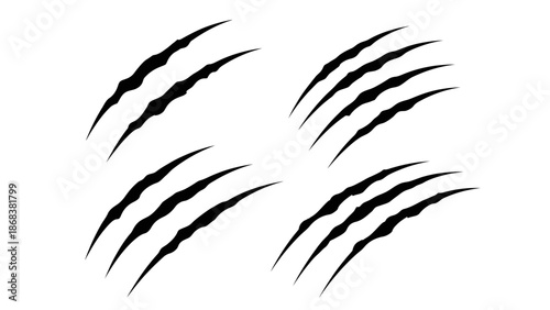 Set of black claw marks scratches on white background symbolizing animal scratches or fierce