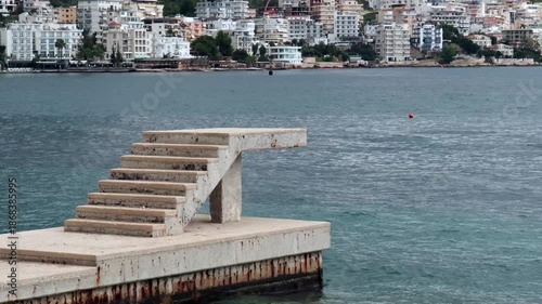 Wallpaper Mural Betonsteg mit Treppe vor dicht bebauter Hanglage in der Bucht, Saranda, Qark Vlora, Albanien Torontodigital.ca
