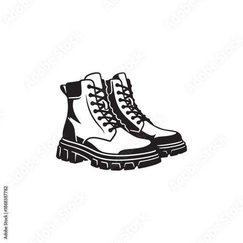 Stylish black and white boots with thick soles and laces