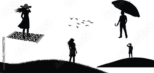 Silhouettes of people standing on hills with birds flying over grass