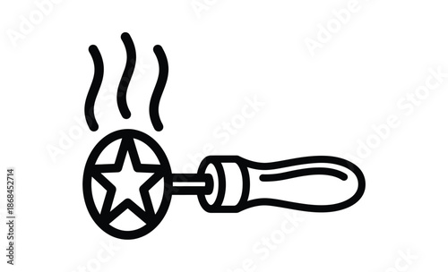 Hot branding iron with star shape symbol. A branding iron with a star shape symbol emitting heat for marking materials.