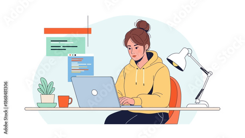 Young woman working on a laptop at a desk with a plant and lamp