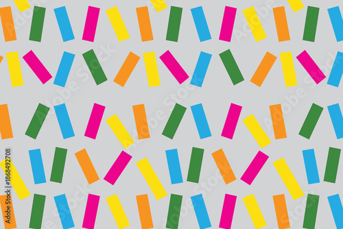 This abstract image features a repeating pattern of small, brightly colored rectangular bars on a light gray background. The bars are arranged in horizontal rows, forming pairs and angled clusters 