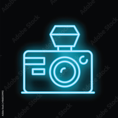 Neon blue camera icon flashing, illuminating a photography studio at night