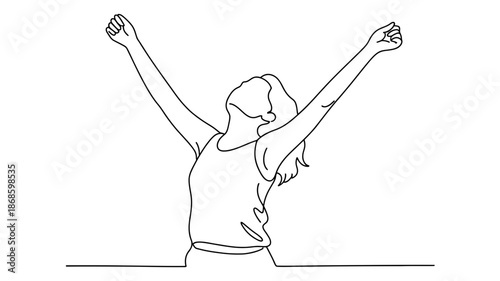 Joyful woman raising her arms in triumph, celebrating success and freedom