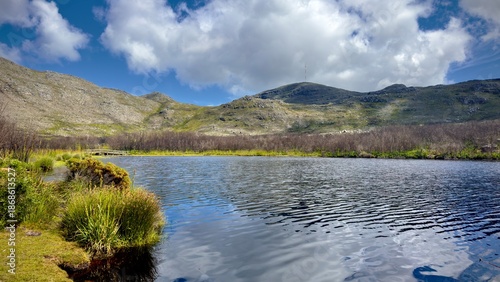 Silvermine dam and mountains. Silvermine park is part of the table mountain national park in Cape Town and offers swimming at the dam and hiking all around with scenic views. 