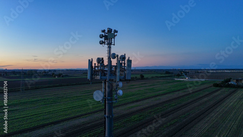 Фотография Cell tower providing essential mobile communication technology and data transmis