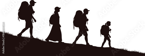 Group Silhouette of Diverse Family Hikers with Backpacks Walking Downhill on Mountain Trail During Summer Outdoor Adventure Trekking Vacation Trip