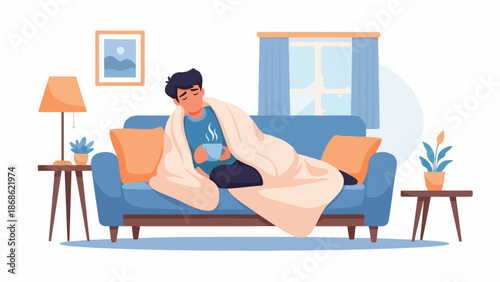 A young man reclines on a blue couch, wrapped in a beige blanket, watching a tablet in a cozy living room with a lamp, side tables, and plants.